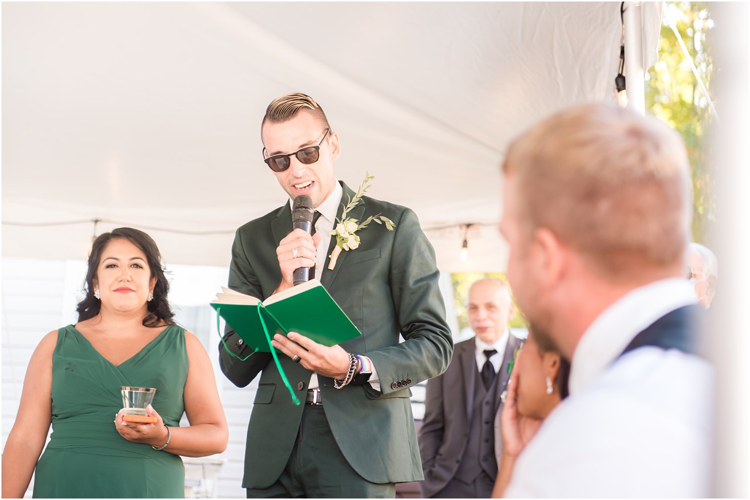 man of honor reads toast during NJ wedding reception