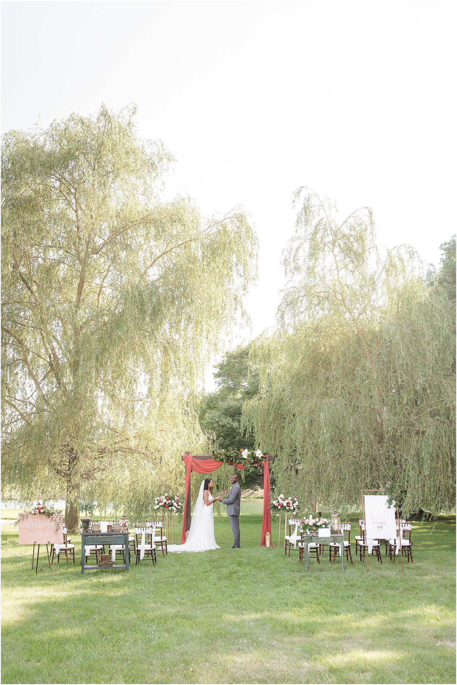 Windows on the Water at Frogbridge microwedding ceremony by willow tree