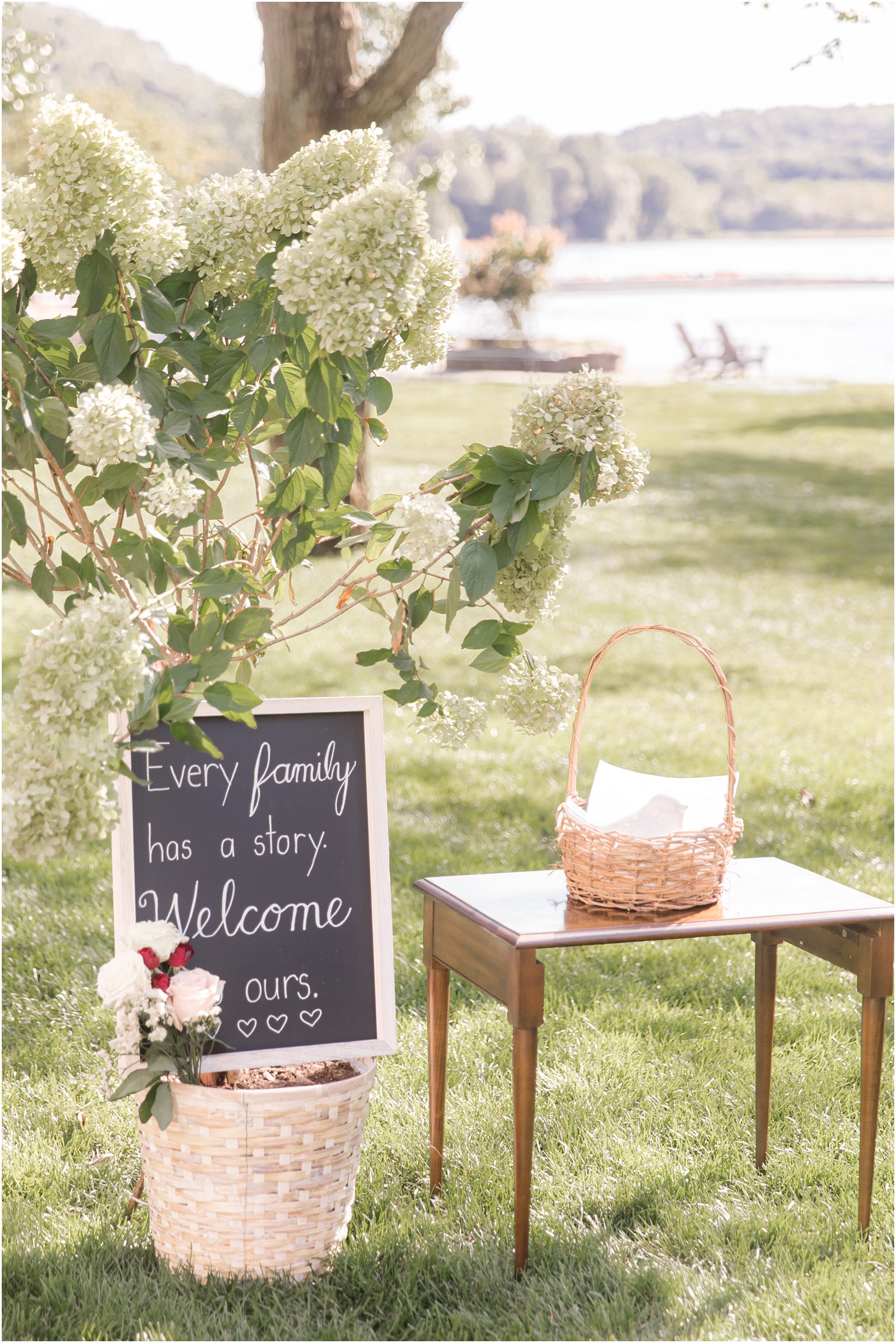 wedding ceremony welcome sign at waterfront wedding