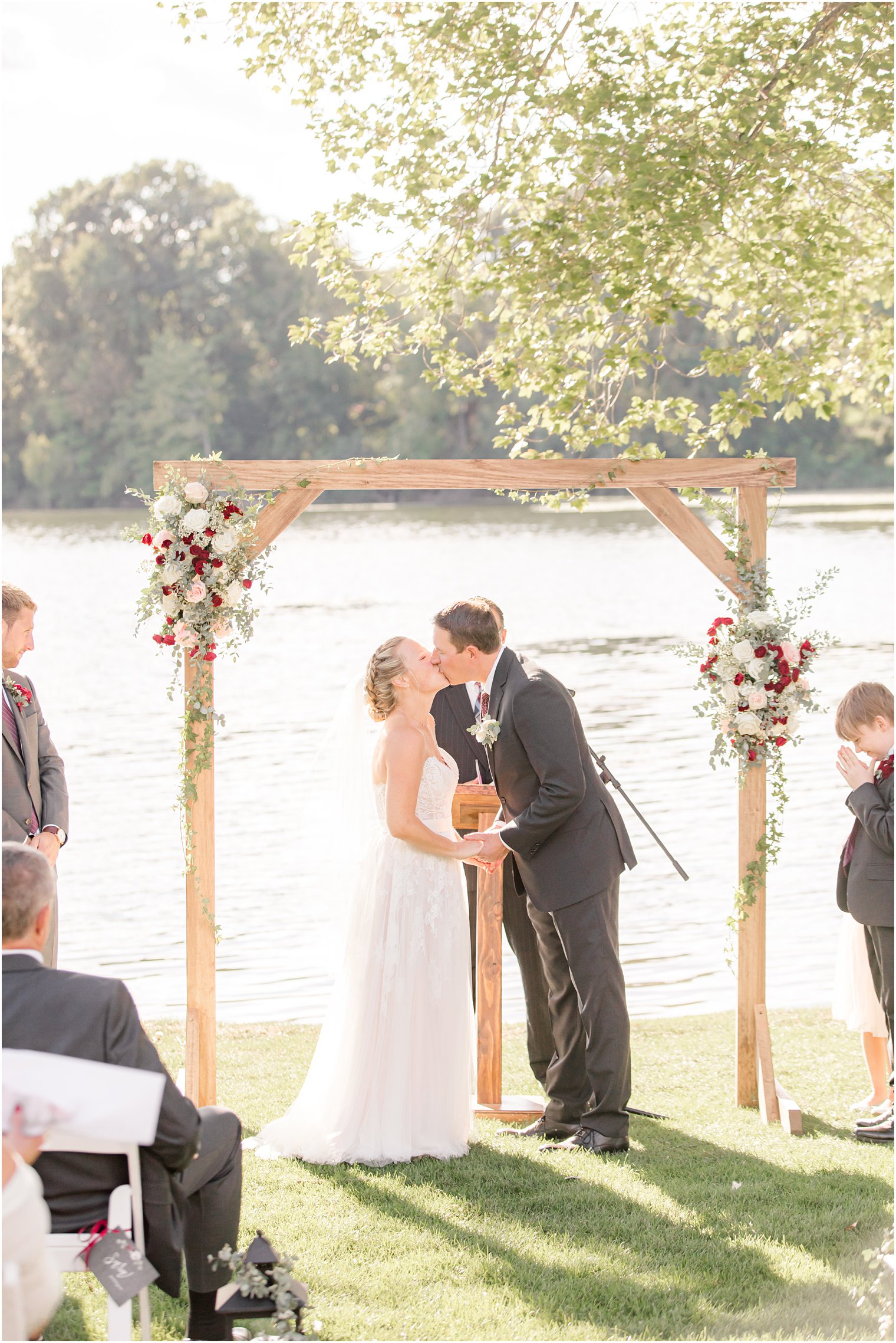 newlyweds kiss during Indian Trail Club Micro Wedding