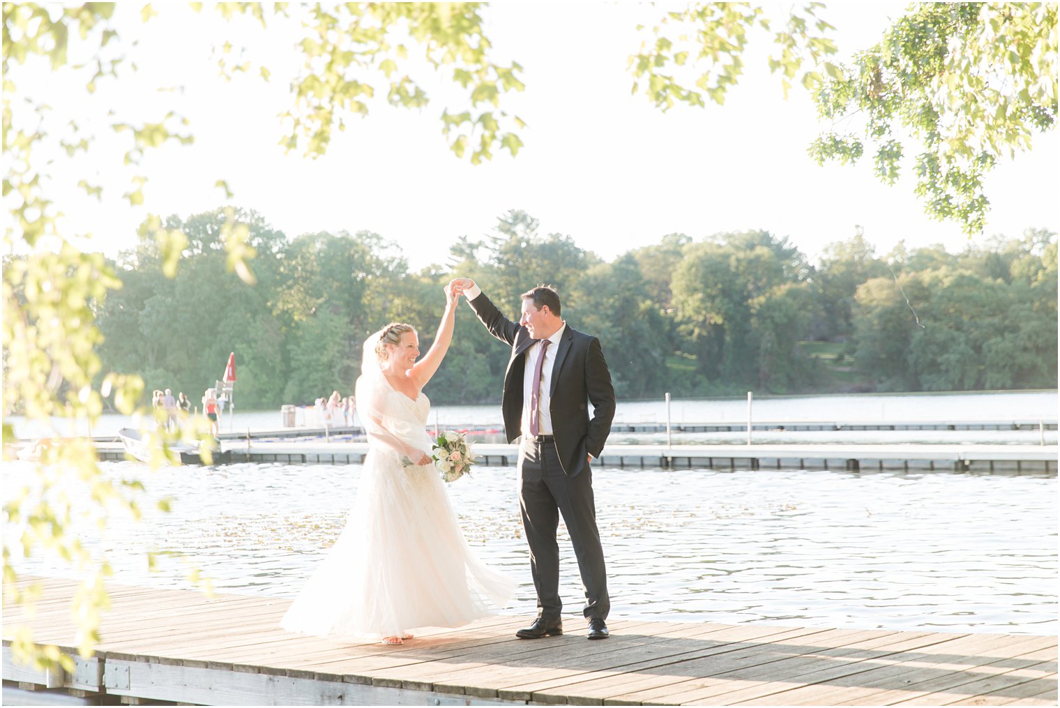 bride and groom dance on dock at Indian Trail Club