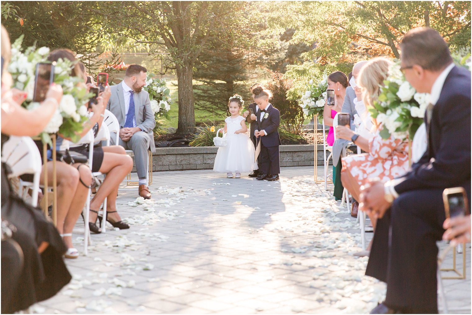 flower girl and ring bearer walk down aisle at NJ wedding