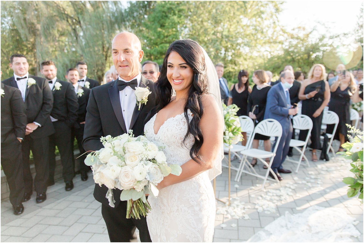 bride walks to ceremony with dad during NJ wedding