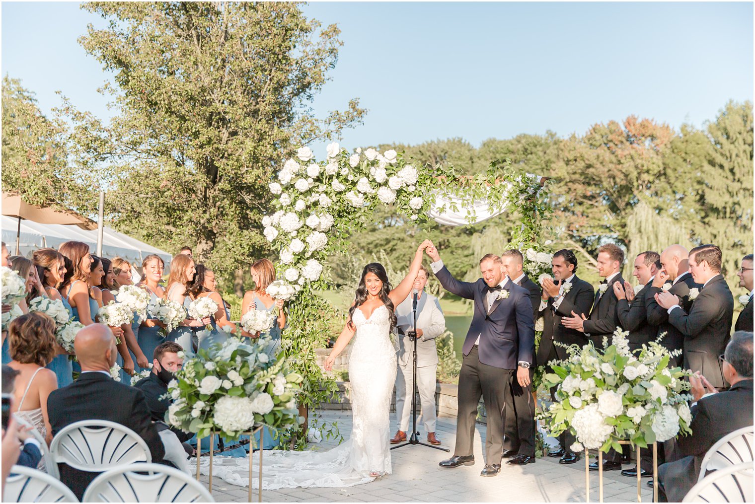 summer Windows on the Water at Frogbridge wedding ceremony with white florals