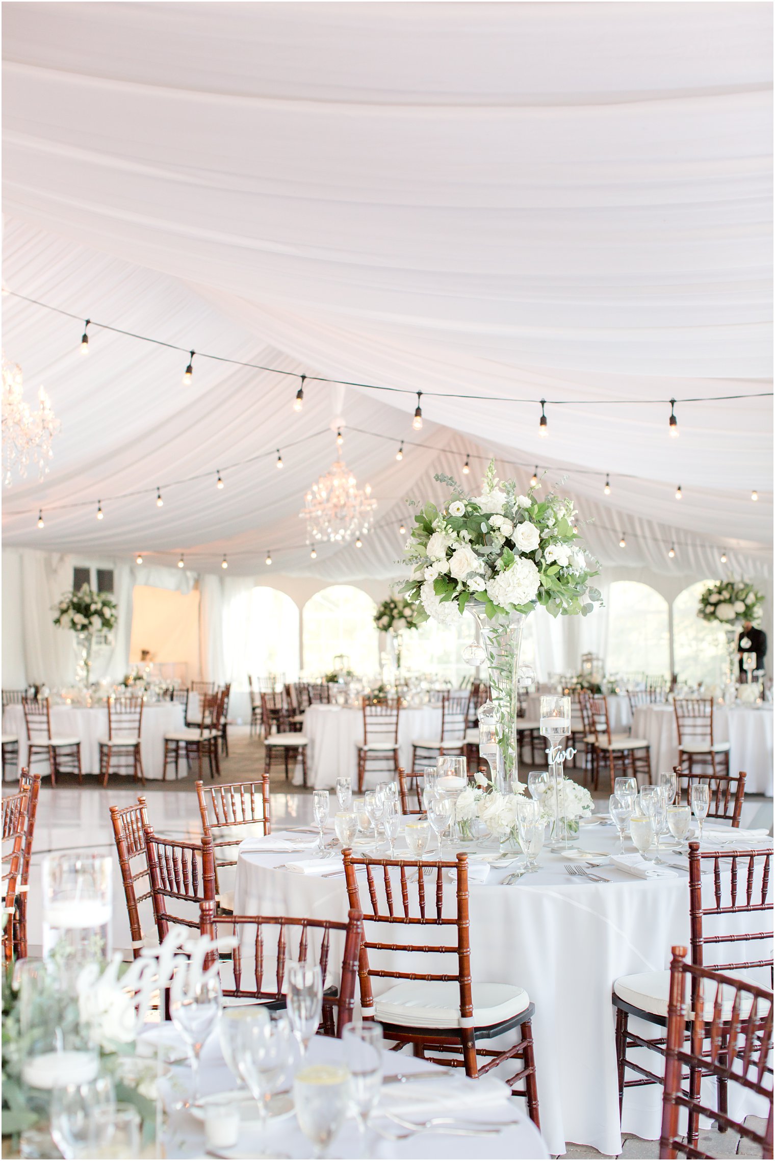 rustic modern Windows on the Water at Frogbridge wedding reception under tent