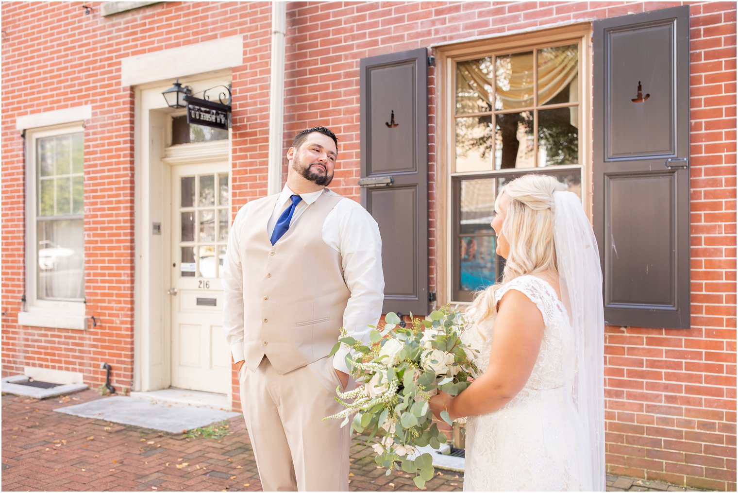 groom turns for first look and sees bride for the first time