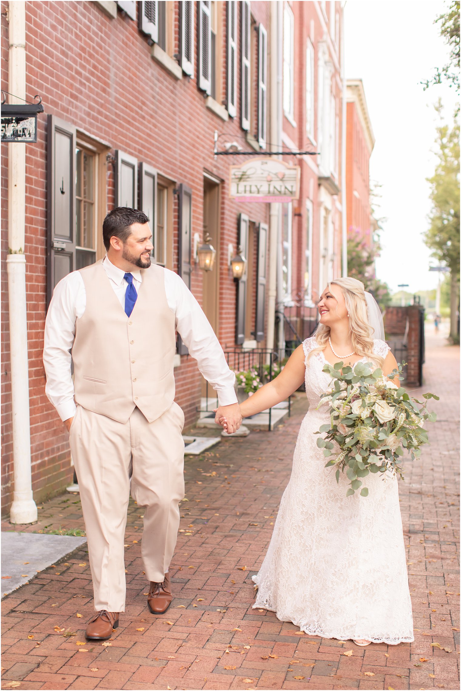 wedding portraits in New Jersey on sidewalk by The Lily Inn