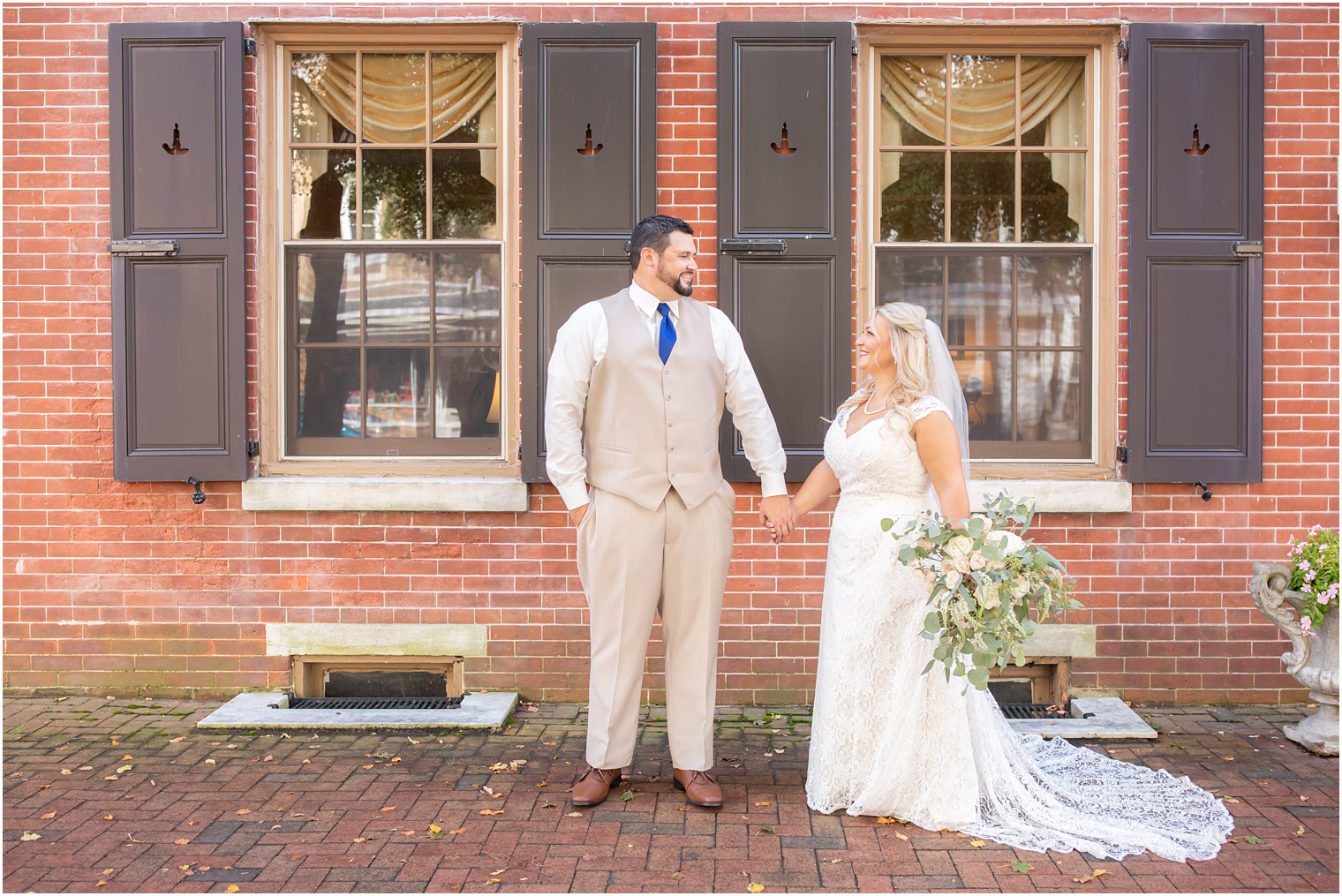 New Jersey couple holds hands and looks at each other before Micro Wedding at The Lily Inn