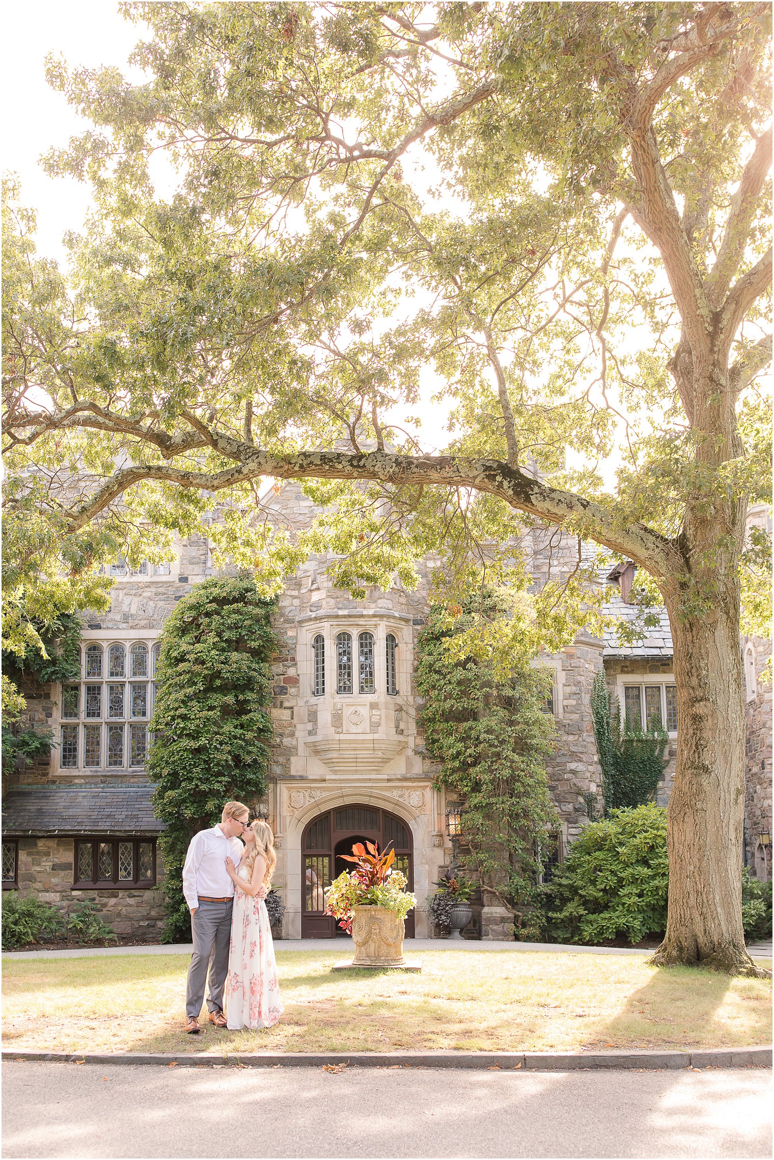 bride and groom kiss outside Skylands Manor