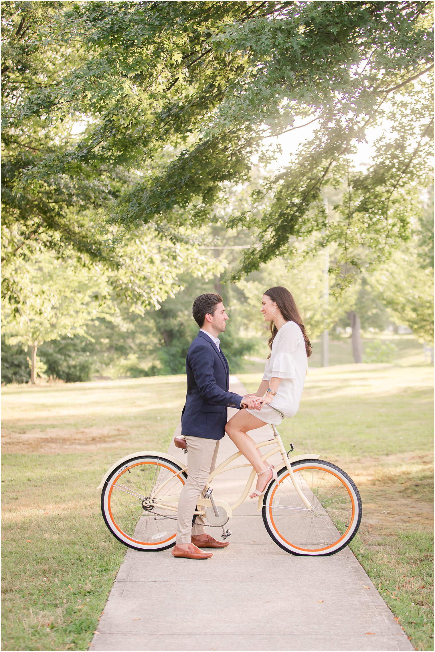 New Jersey engagement session with bride sitting on bike handles