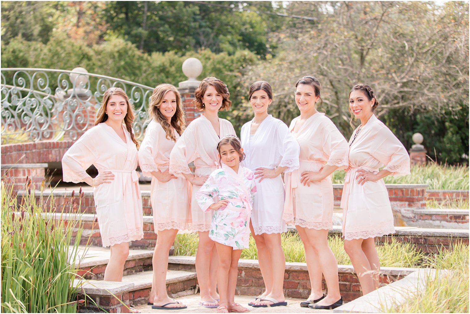 Bridesmaids wearing robes during bride prep at The Manor in West Orange NJ