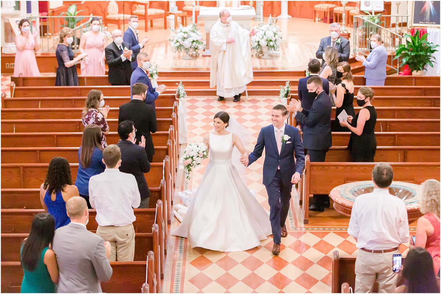Wedding ceremony recessional at Church of the Assumption in Morristown, NJ