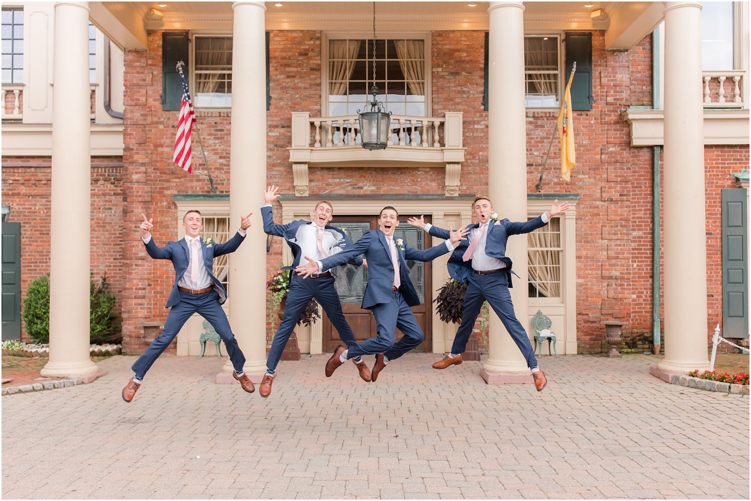 Groomsmen jumping photo