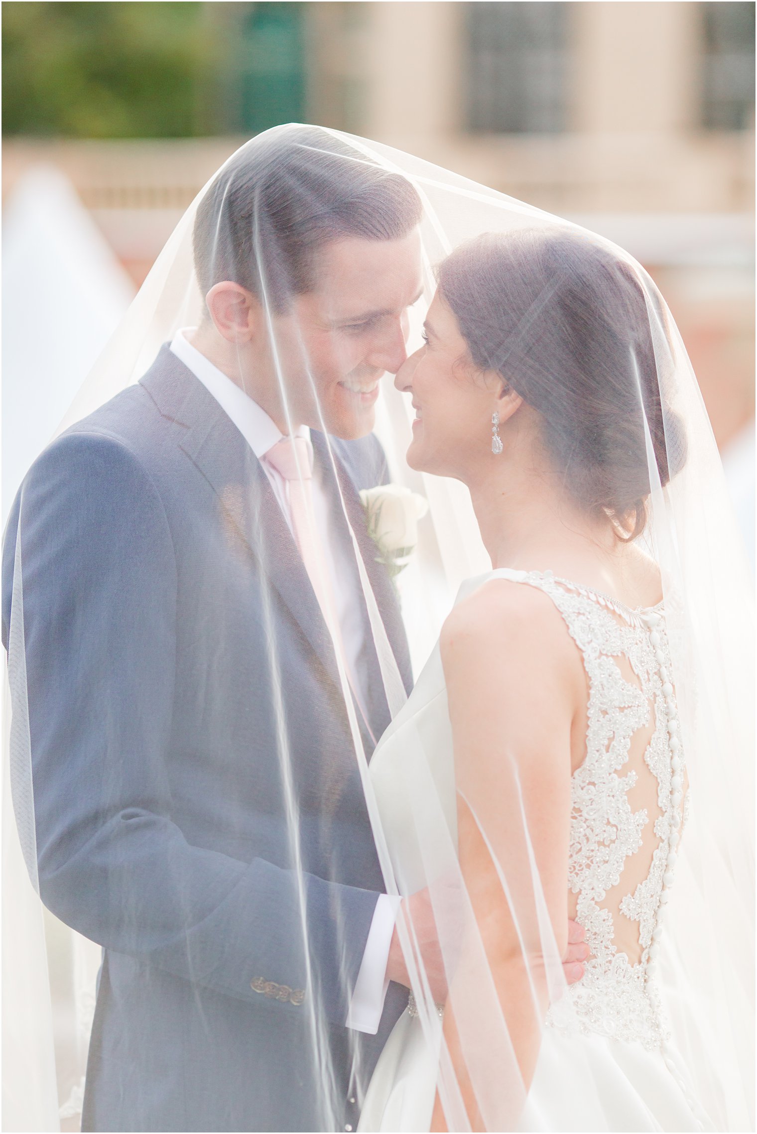 Bride and groom under the veil at The Manor in West Orange NJ