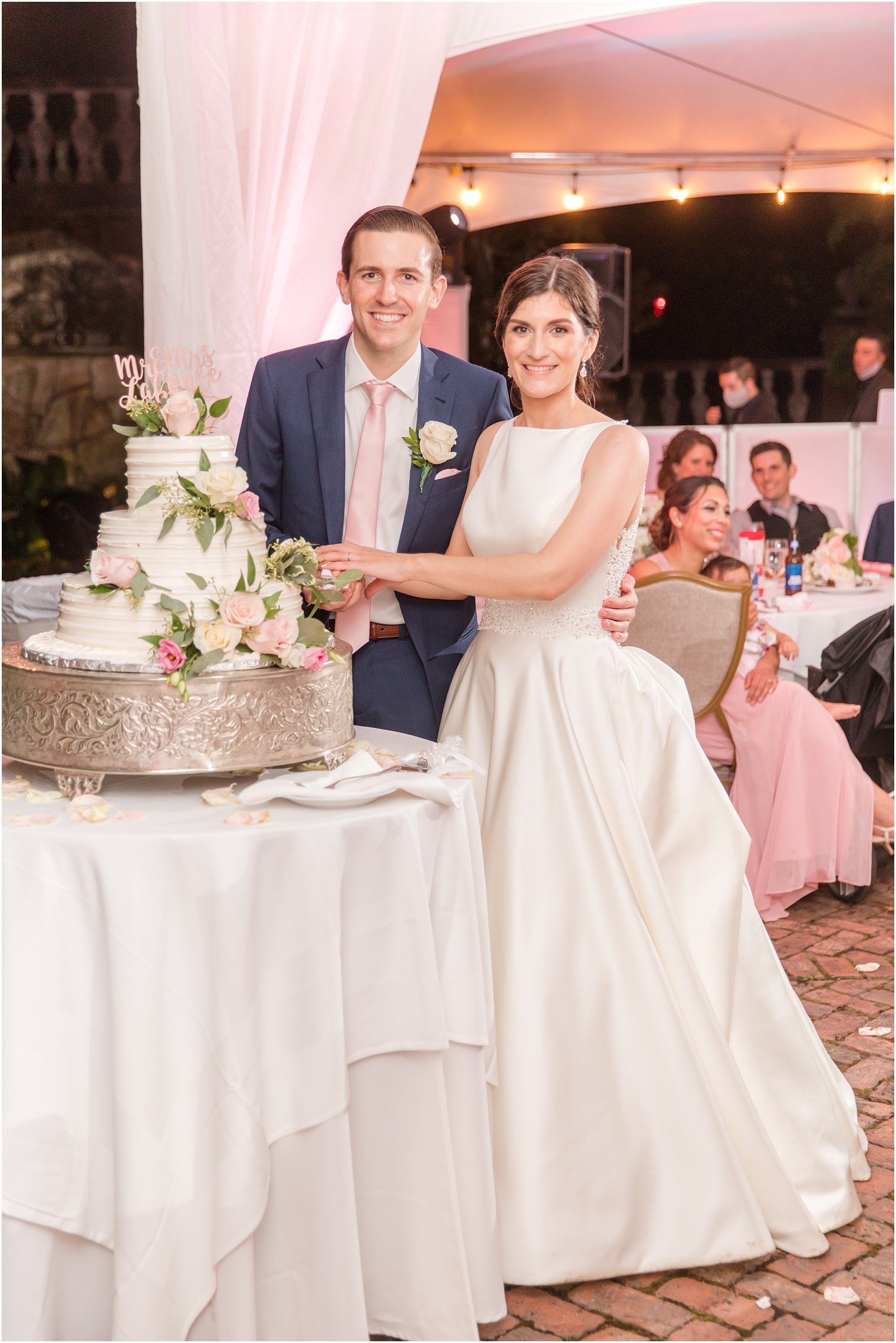 Bride and groom cutting their cake at The Manor in West Orange NJ