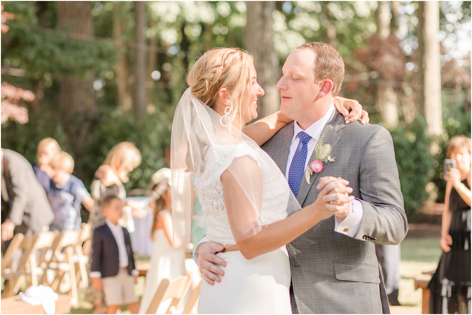 bride and groom dance during Westfield NJ backyard wedding reception