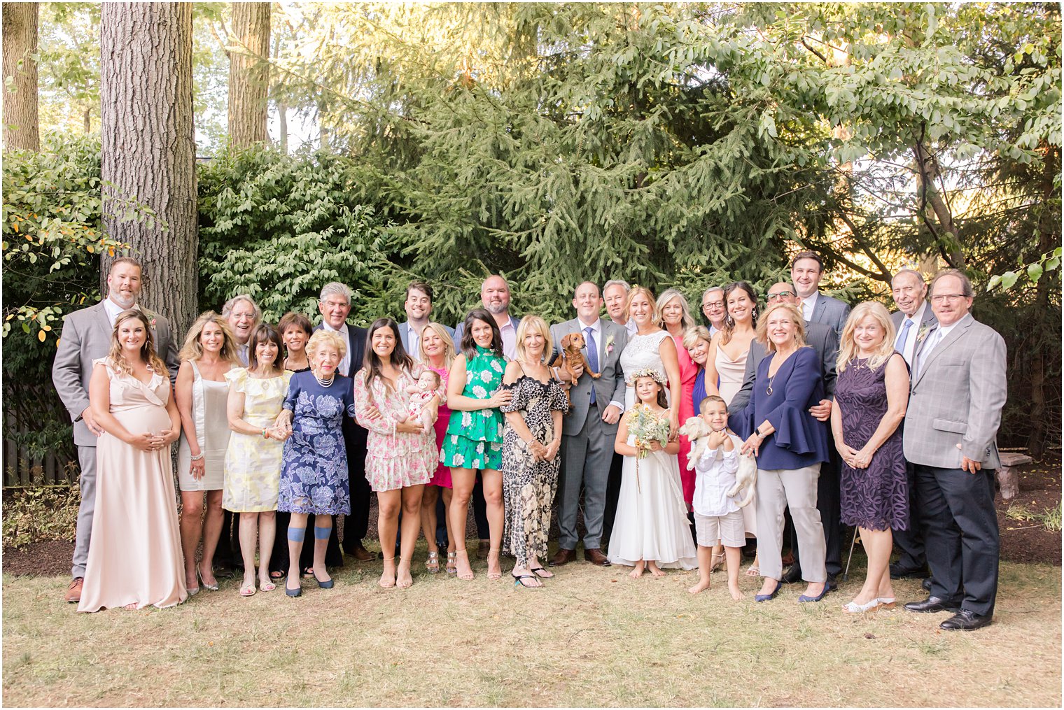 guests for New Jersey wedding pose with bride and groom