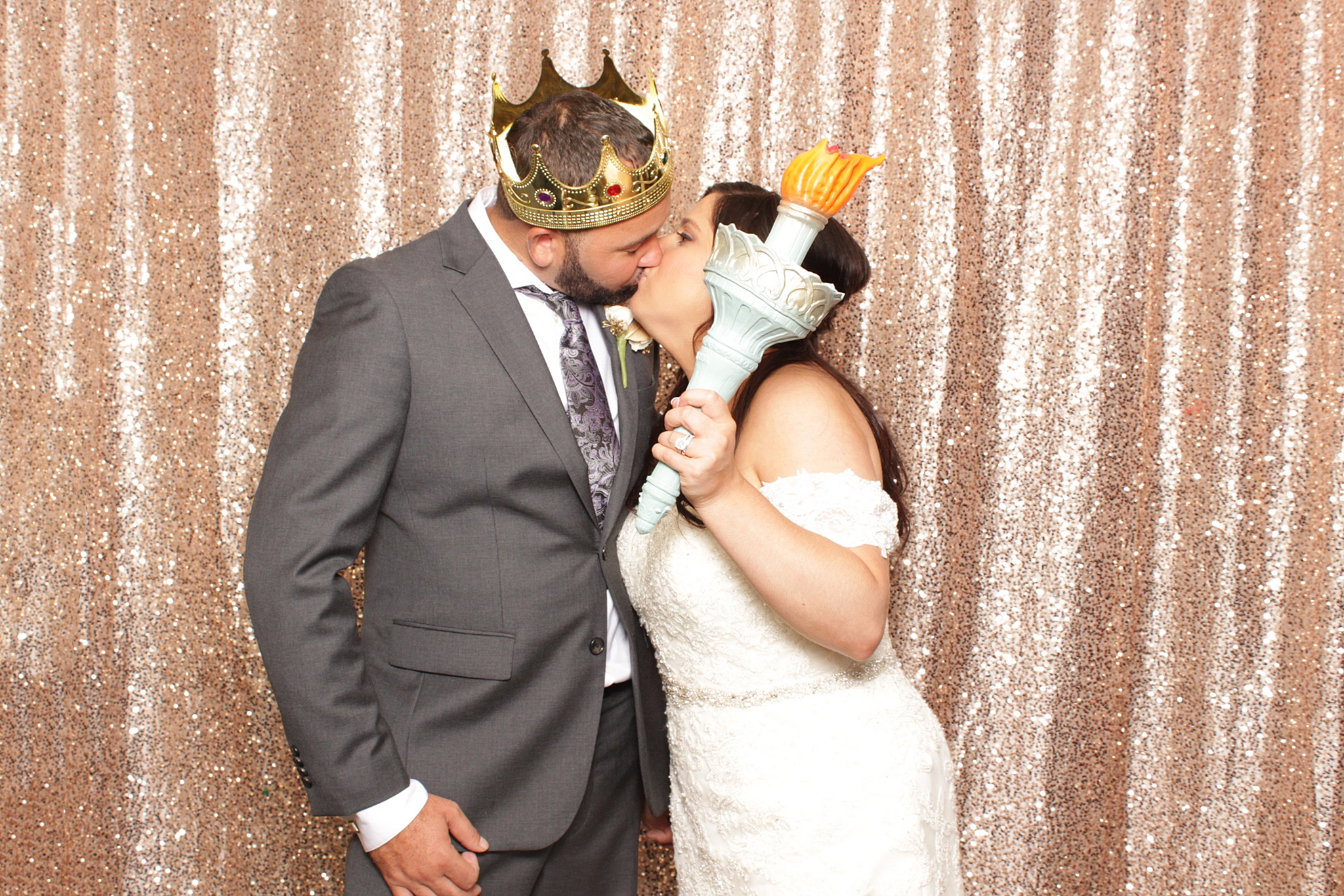 newlyweds kiss during photo booth from Idalia Photograph