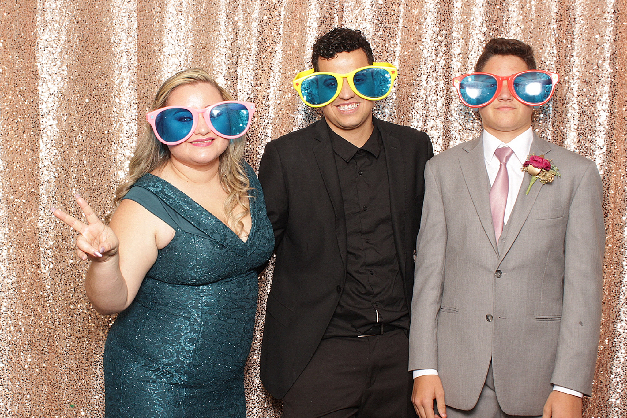 playful guests during Clarks Landing Yacht Club wedding photo booth by Idalia Photography