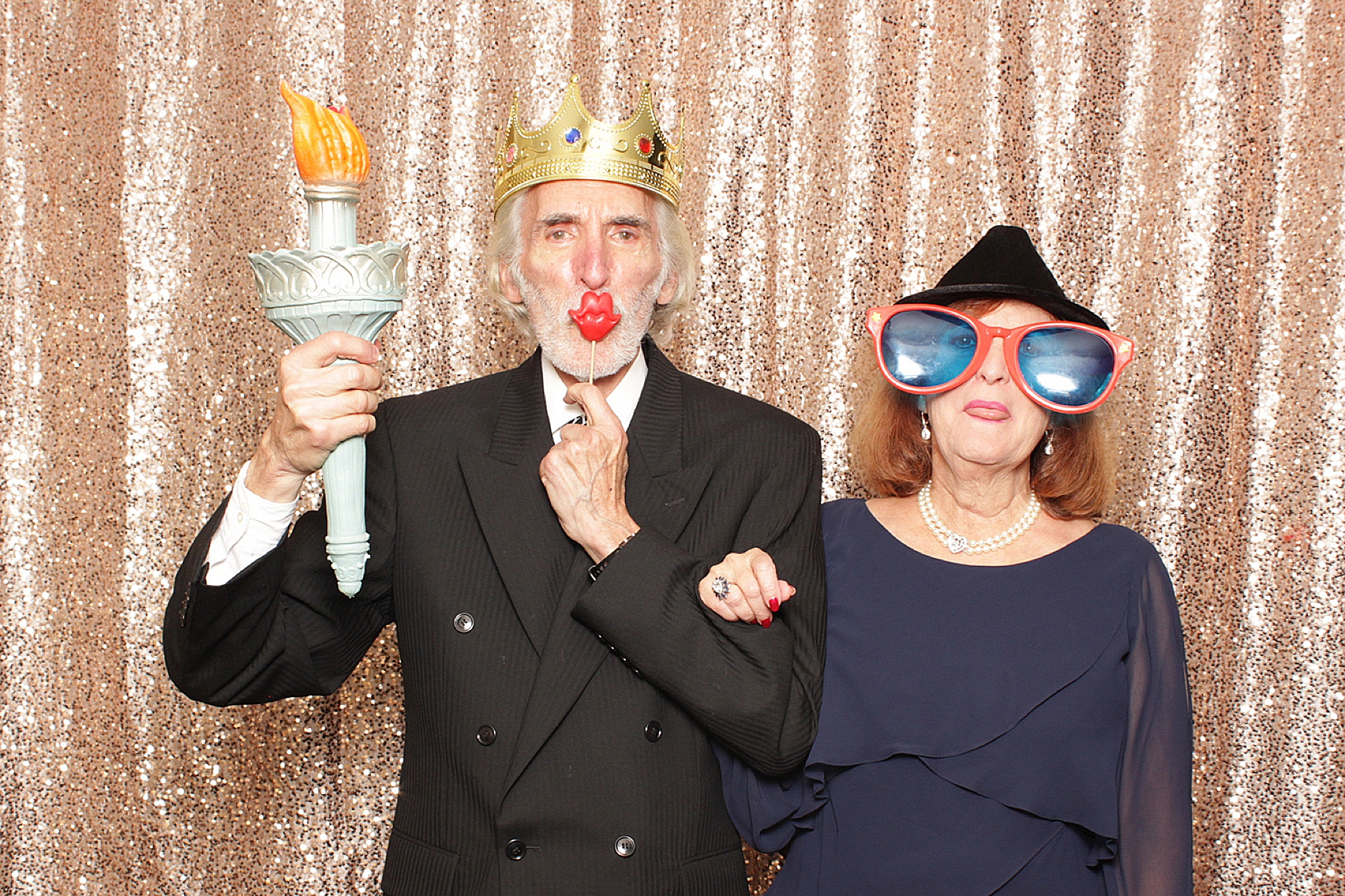 guests have fun during photo booth by Idalia Photography