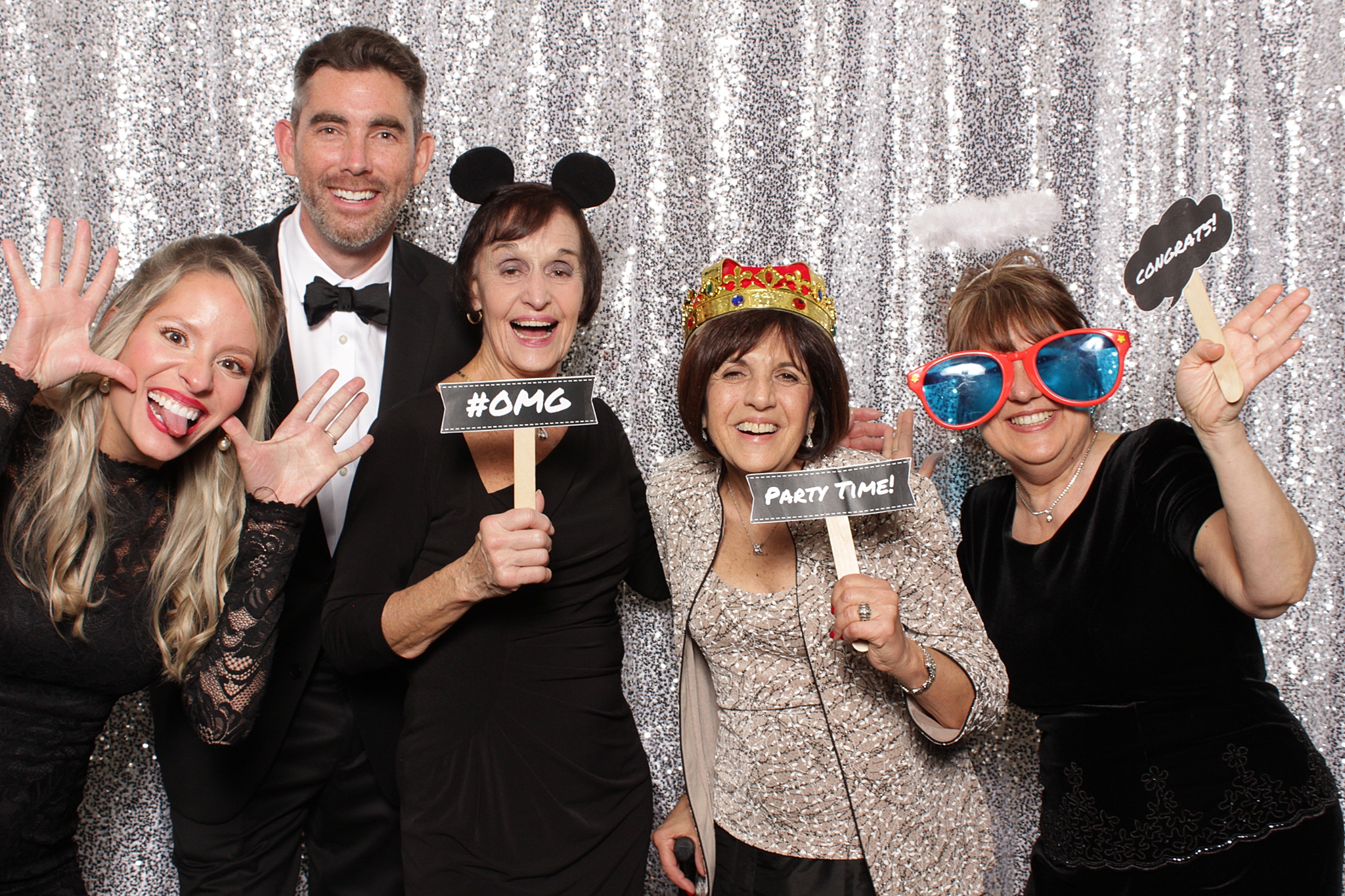 wedding guest pose with silly signs and props