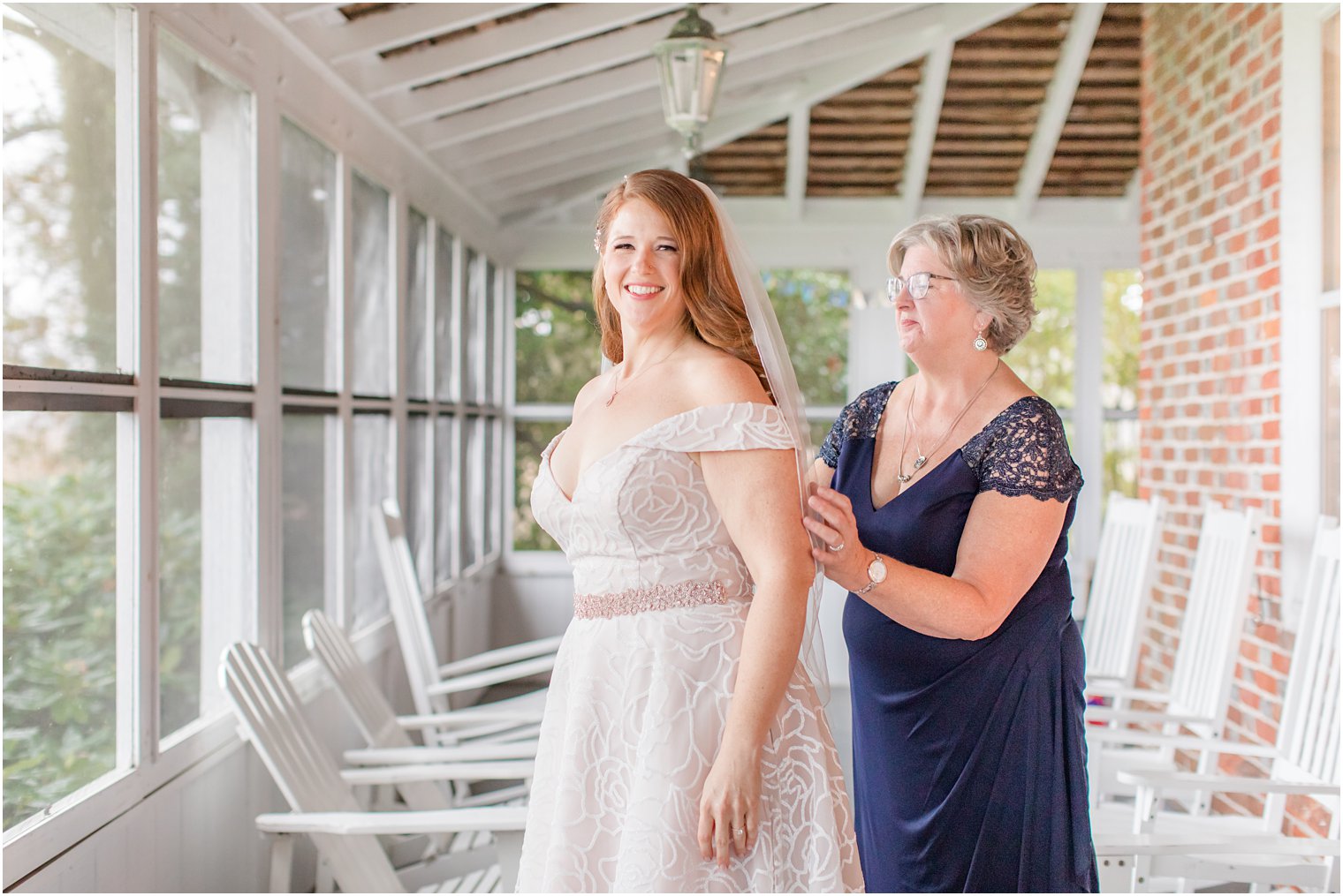 bride prepares for Jersey Shore wedding with mom in navy gown