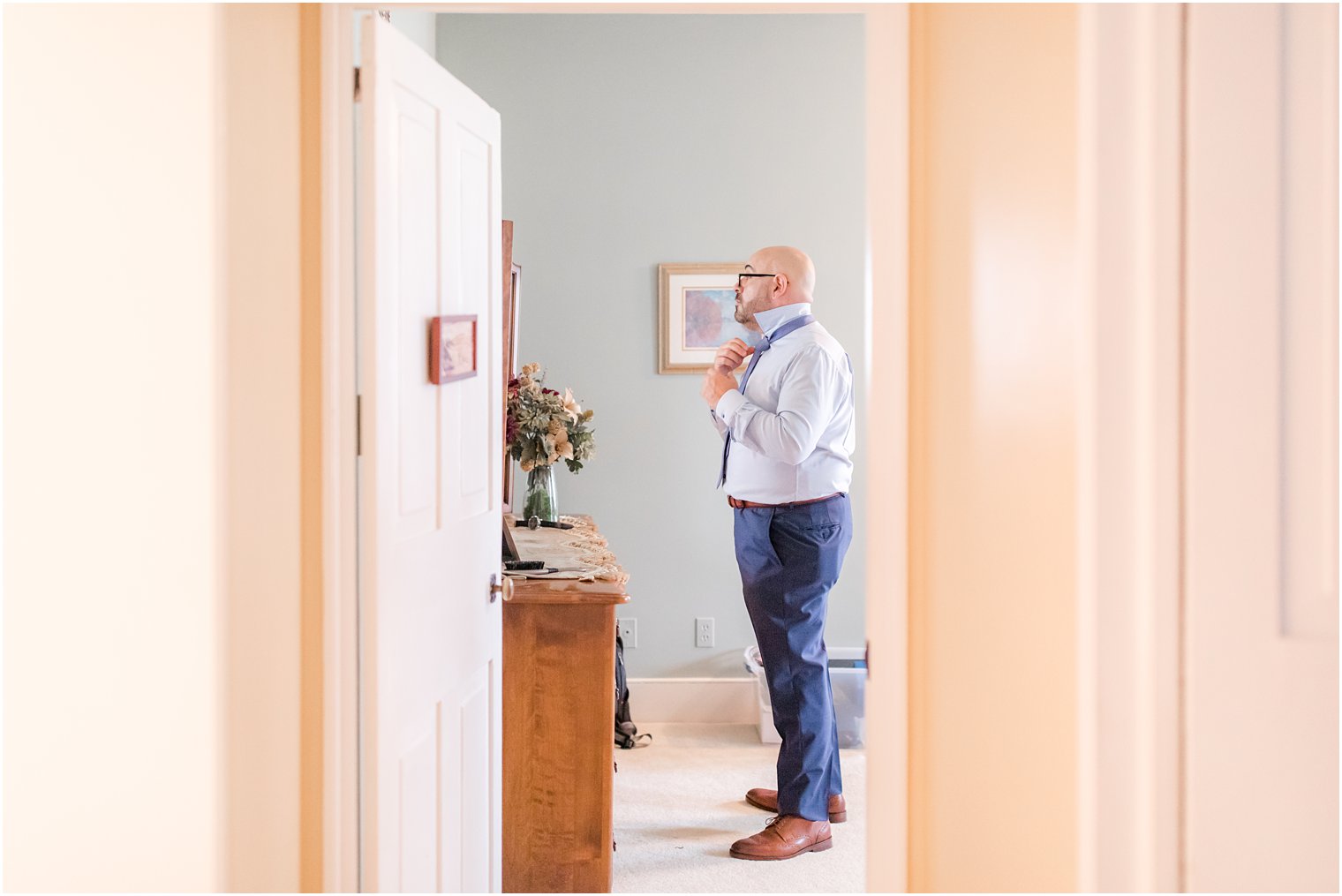 groom prepares for Eagle Manor Wedding