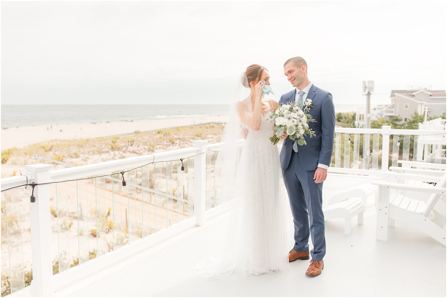 bride cries during first look on Long Beach Island