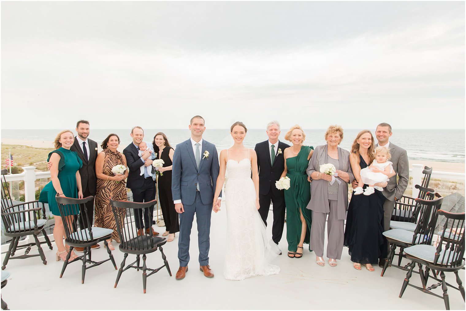 bride and groom pose with family after Long Beach Island Intimate Wedding ceremony