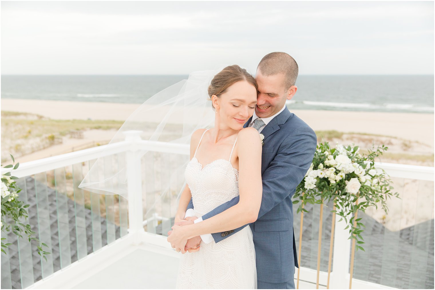 beach wedding portraits after intimate ceremony 