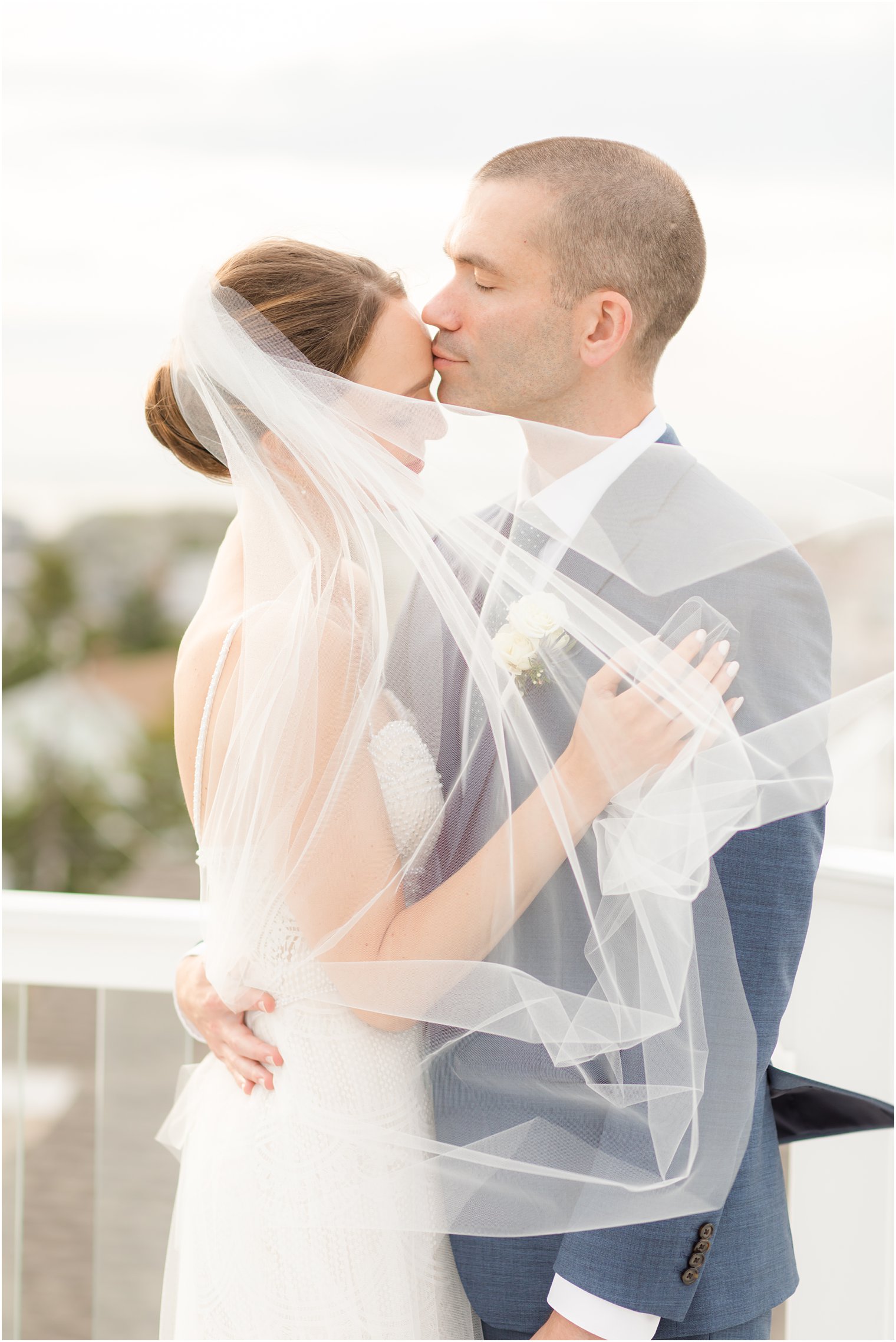 Long Beach Island wedding portraits on rooftop