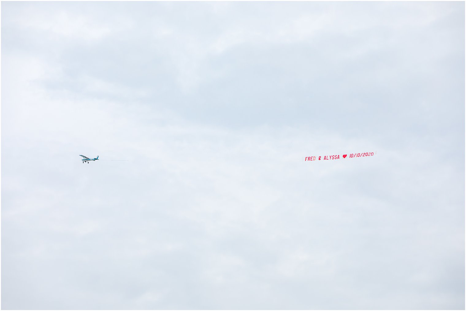 airplane flies by with sign to congratulate newlyweds in New Jersey