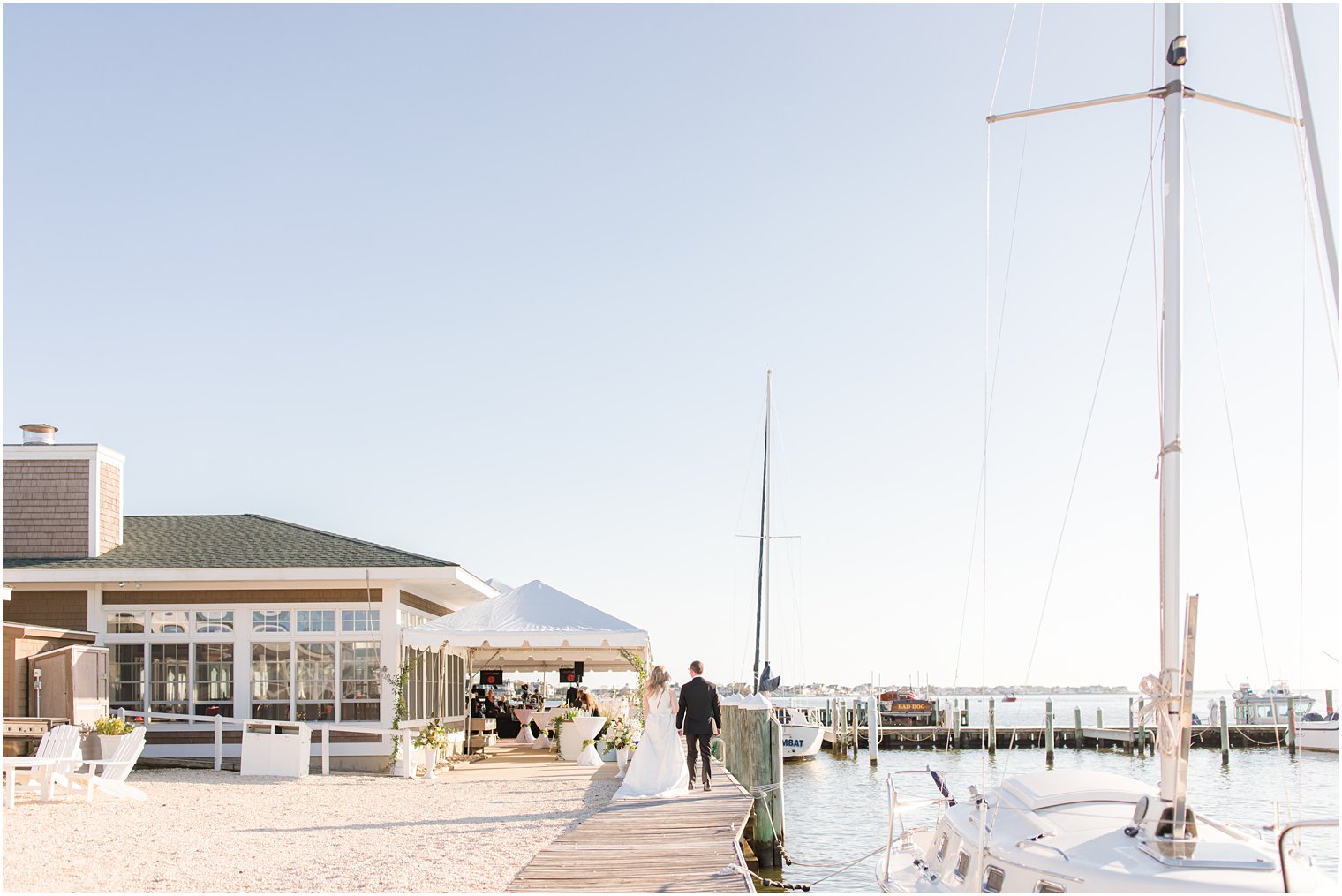 Bride and groom going to reception at Mantoloking Yacht Club wedding