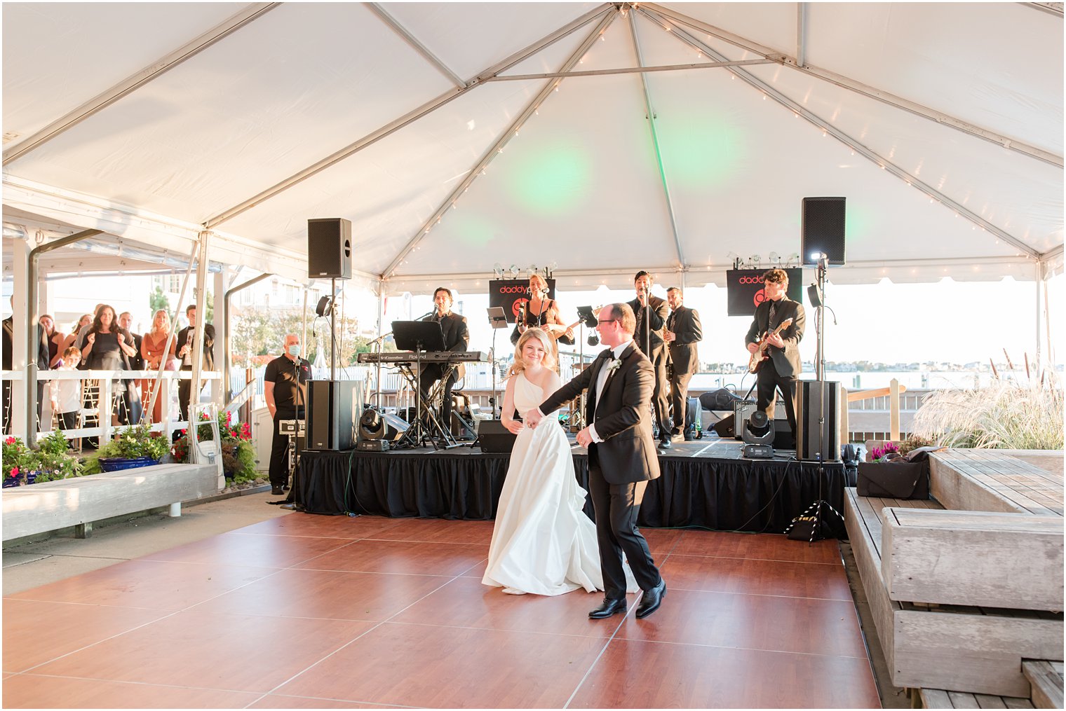 bride and groom dance under tent at Mantoloking Yacht Club