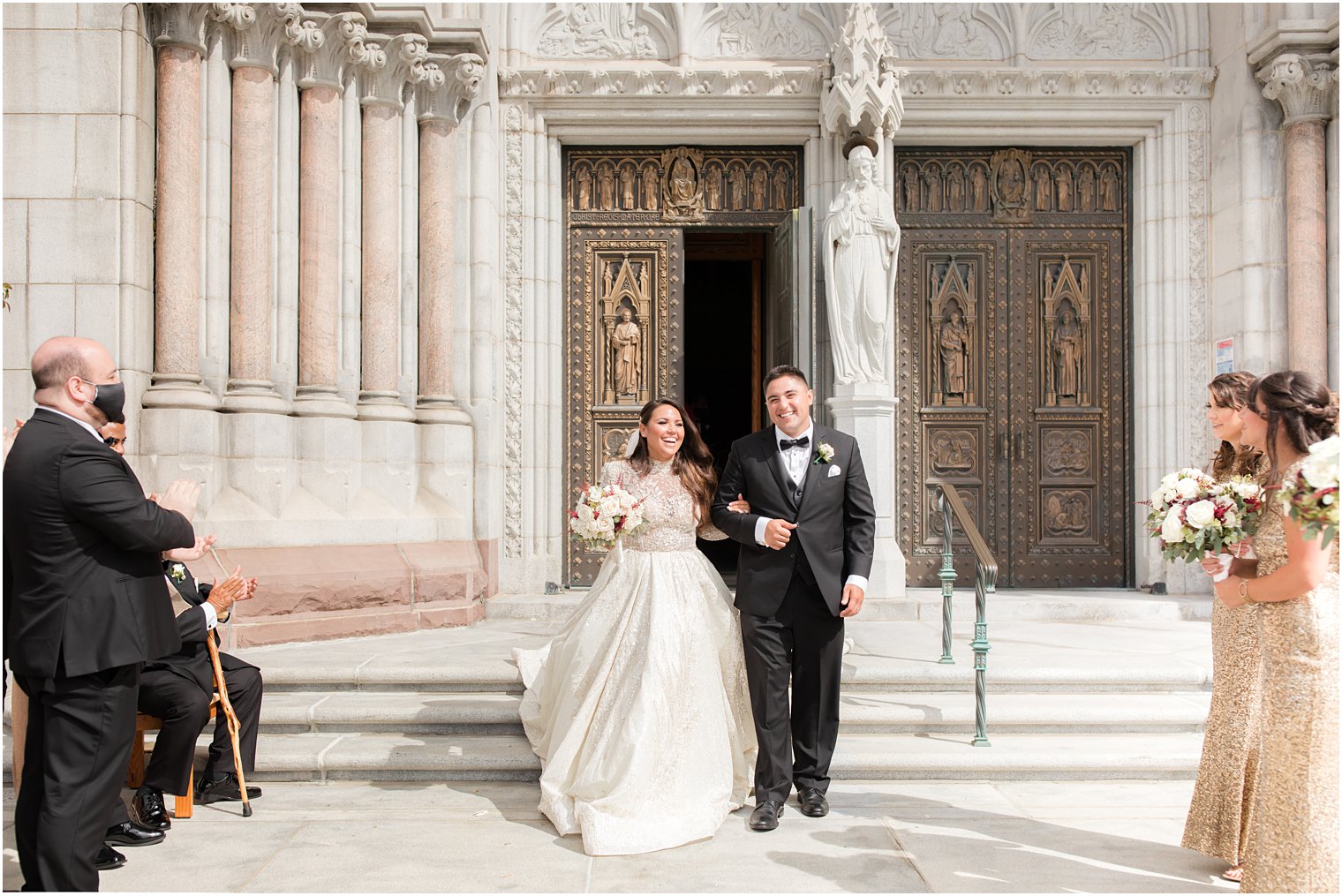 newlyweds leave traditional Catholic wedding at Cathedral Basilica of the Sacred Heart in Newark NJ