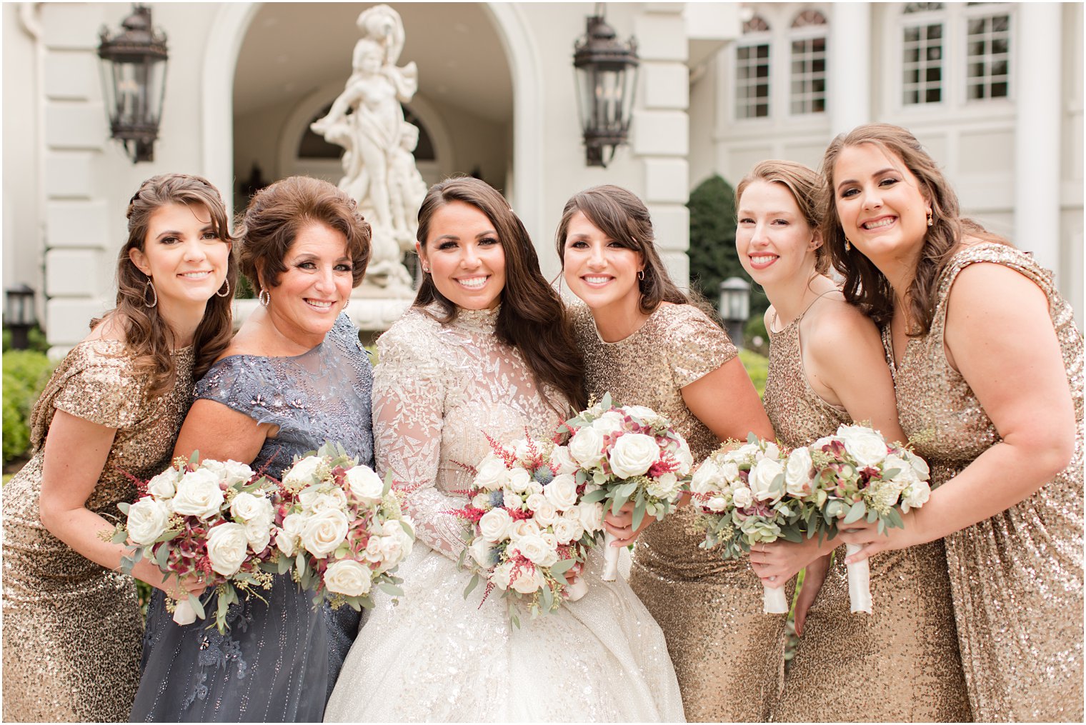 bride poses with four bridesmaids and matron of honor in New Jersey