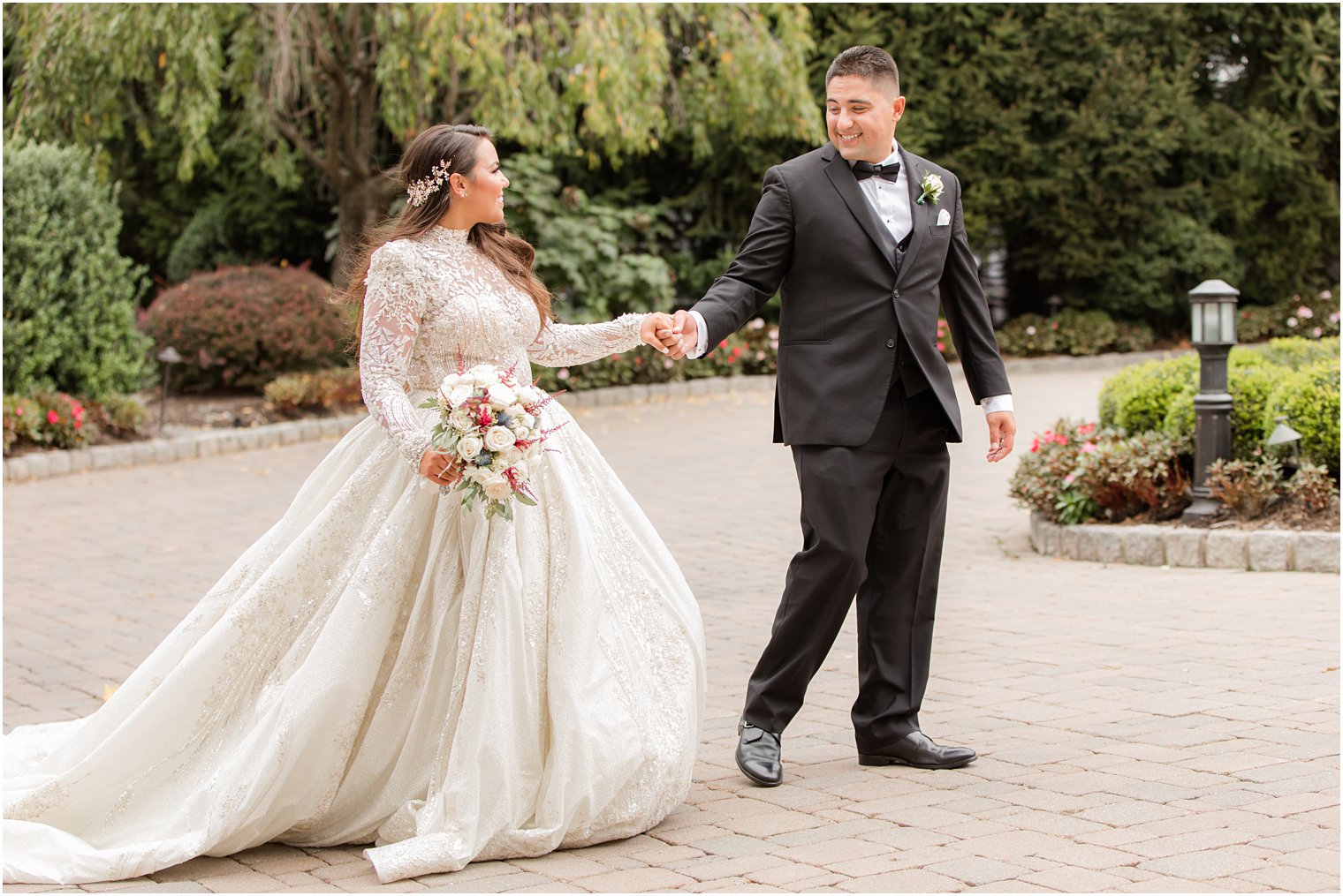 newlyweds walk through Nanina's in the Park