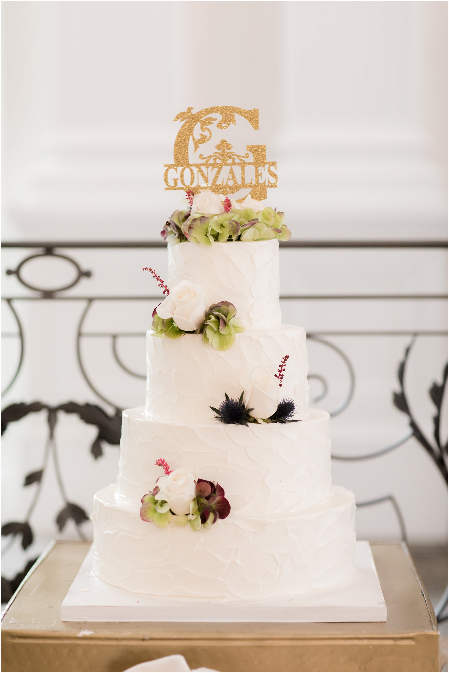 tiered wedding cake with floral accents