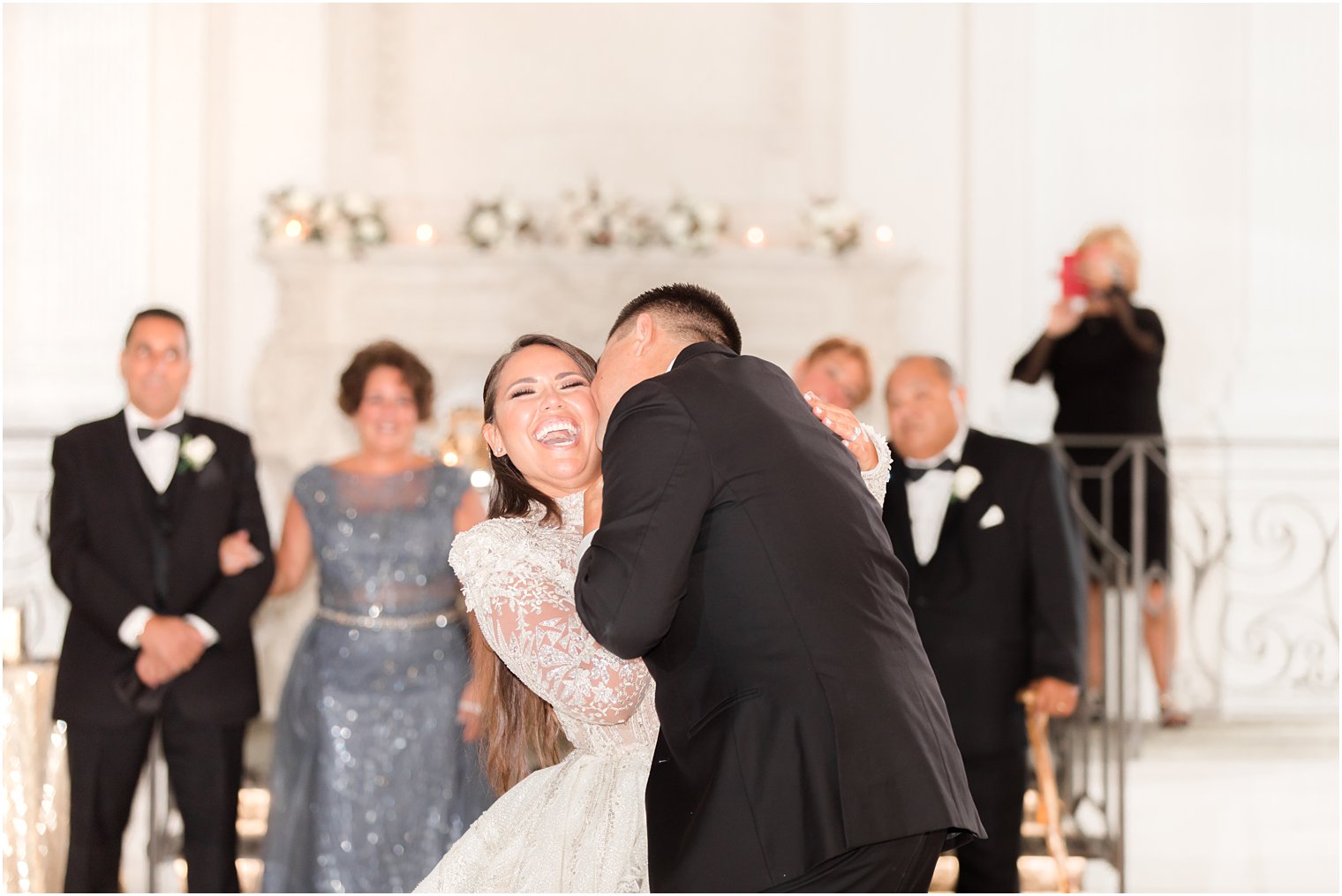 groom makes bride laugh during first dance at Nanina's in the Park