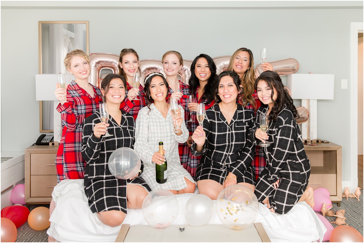 bride and bridesmaids toast before NJ wedding