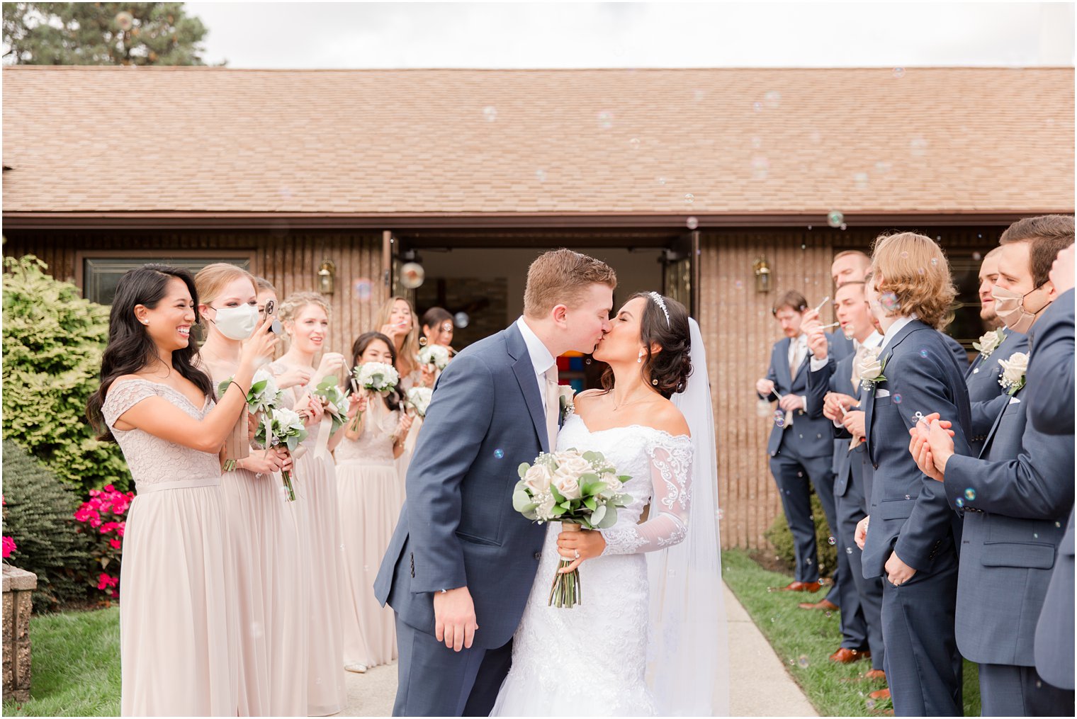 bubble exit after traditional church wedding in New Jersey