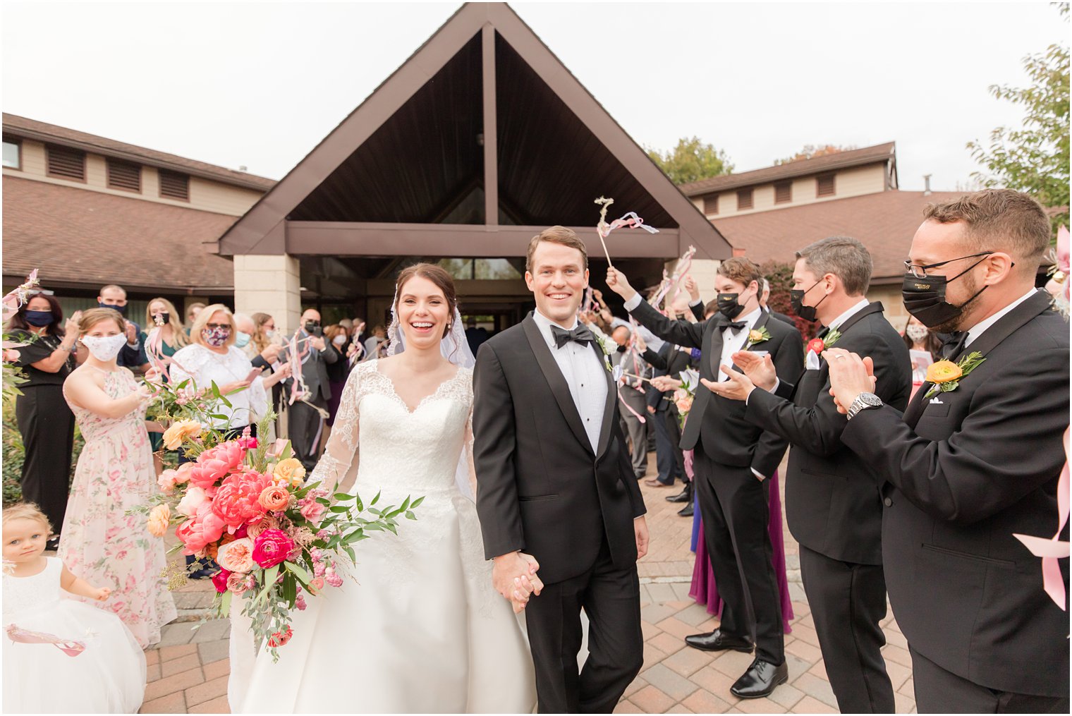 bride and groom leave wedding ceremony in New Jersey