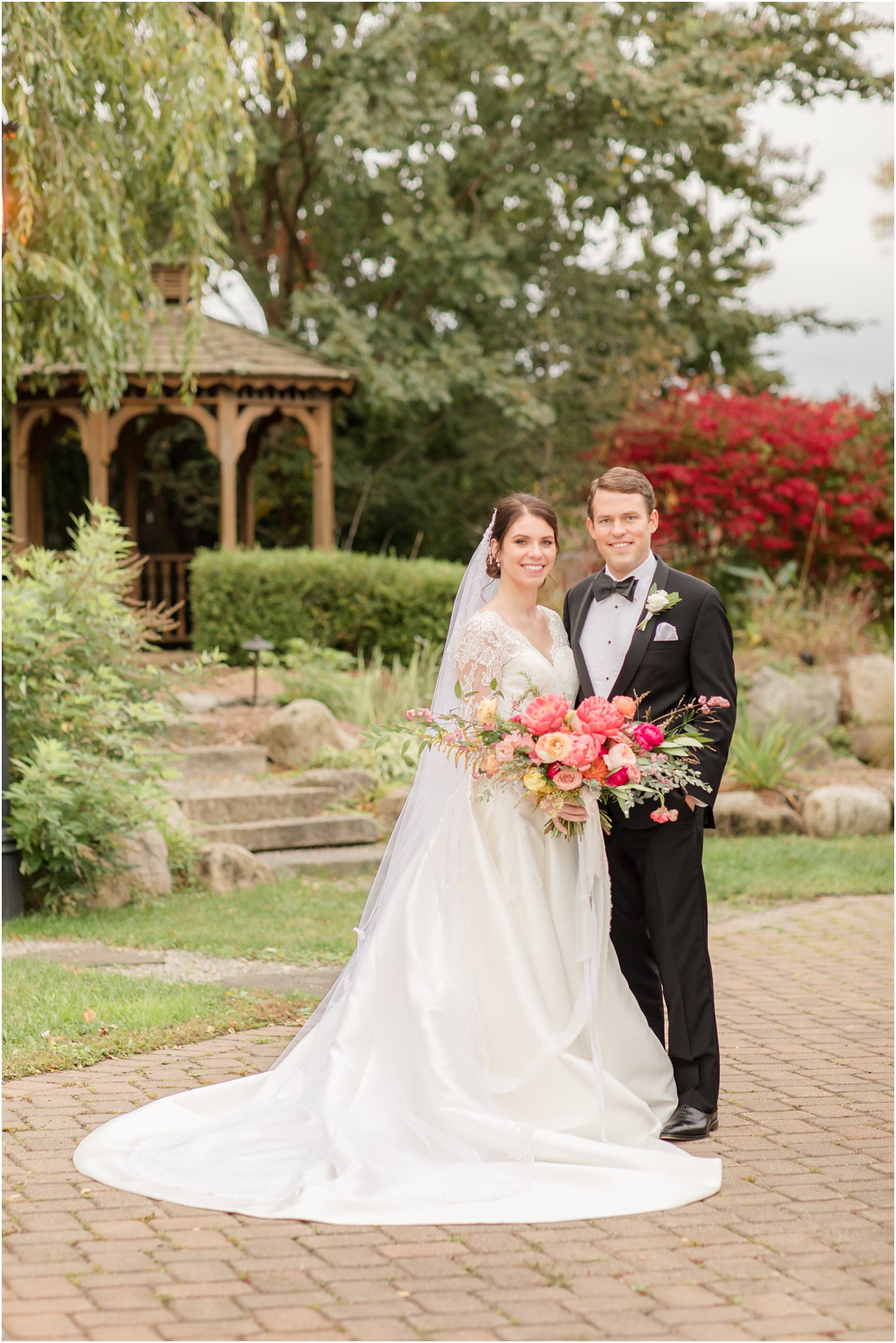 newlyweds pose outside Conservatory at the Sussex County Fairgrounds