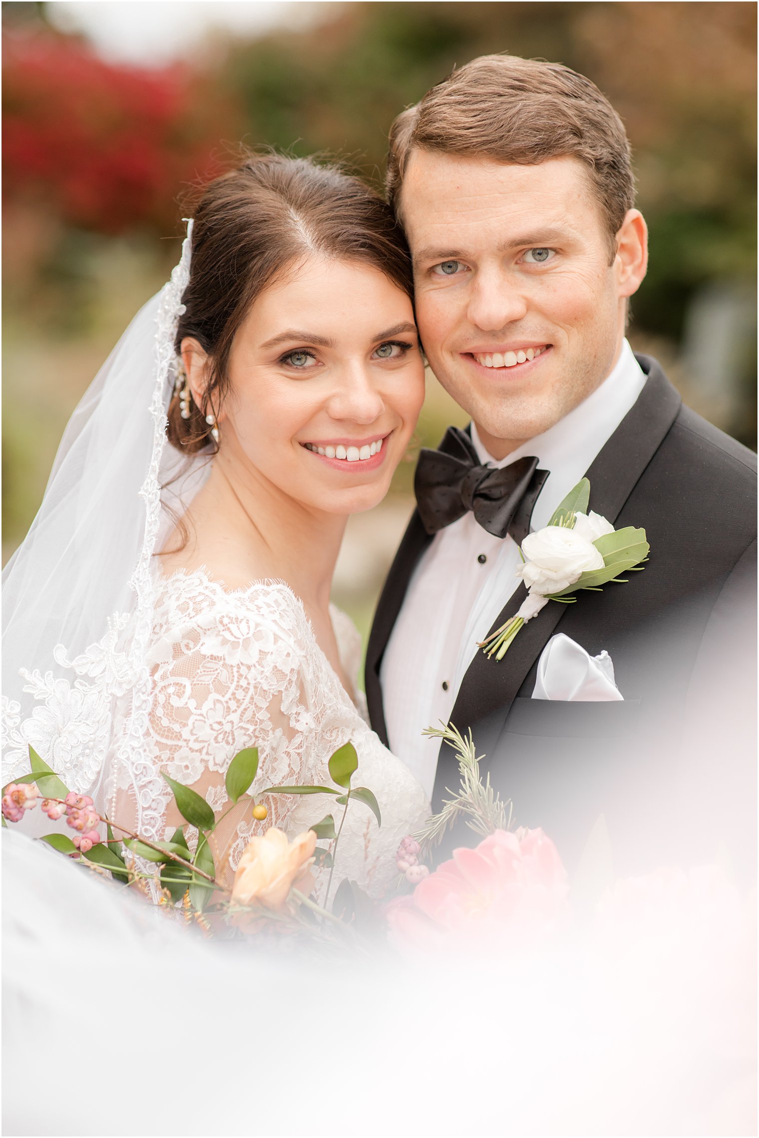 New Jersey bride and groom stand with heads together in Conservatory at the Sussex County Fairgrounds wedding