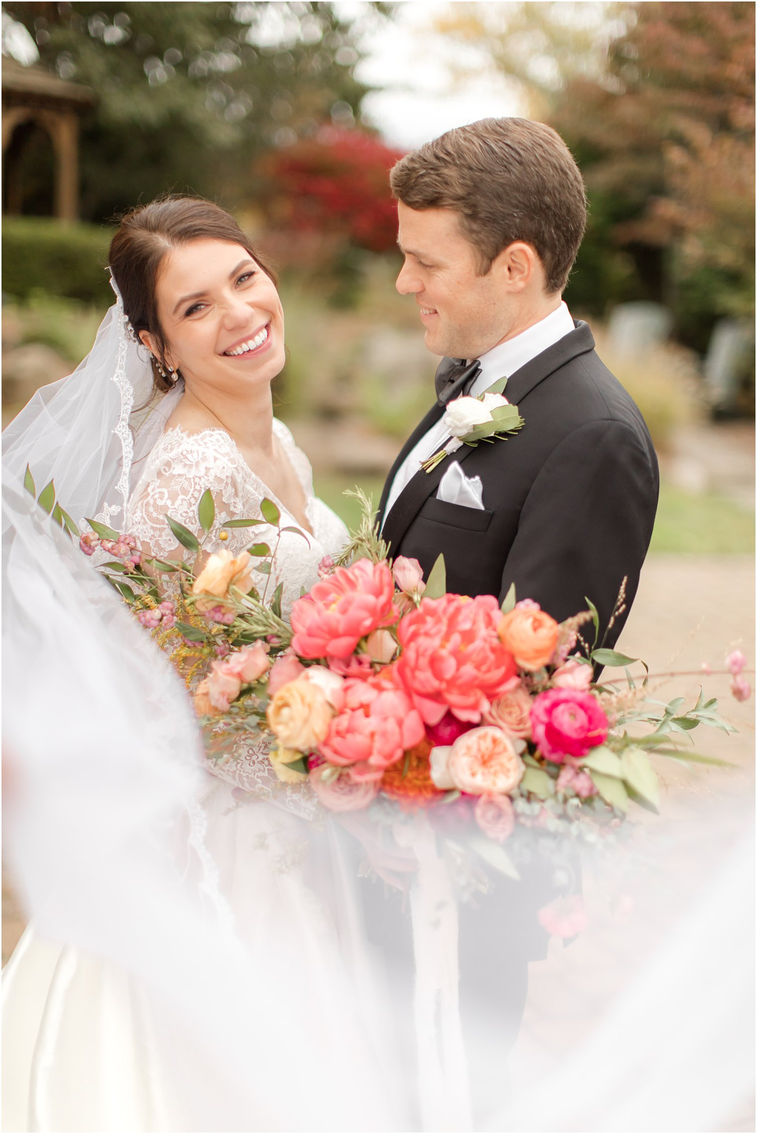 groom makes bride laugh during Augusta NJ wedding portraits