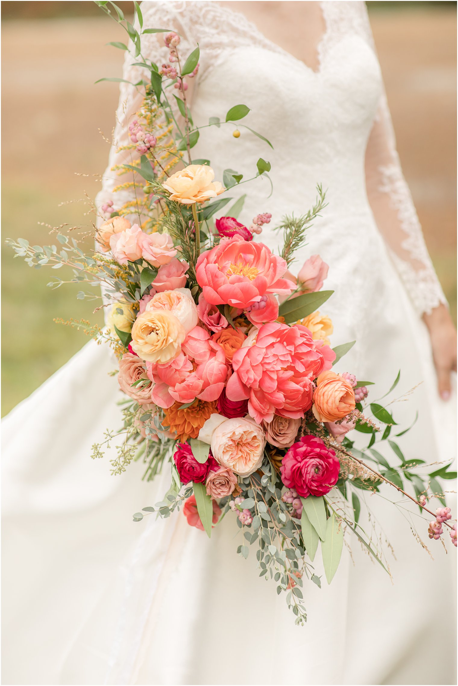 wedding bouquet with pink and peach flowers