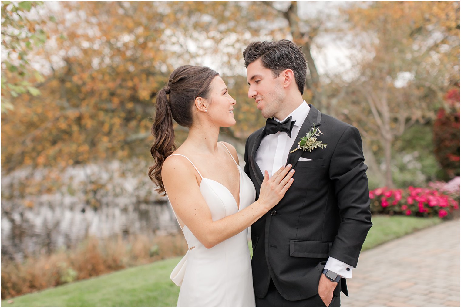 bride and groom look at each other during New Jersey wedding photos
