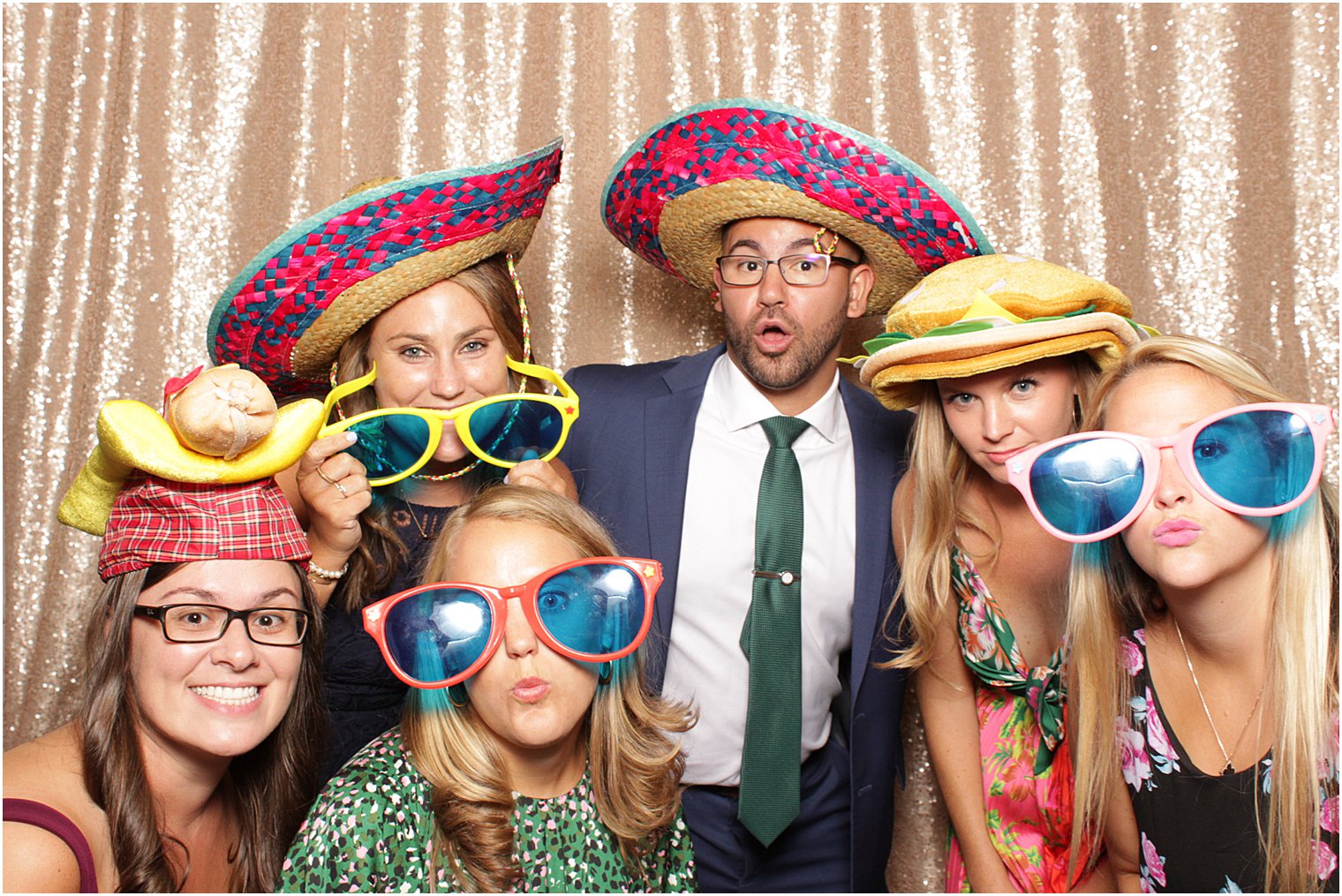 guests in sombreros and sunglasses during NJ wedding reception photo booth