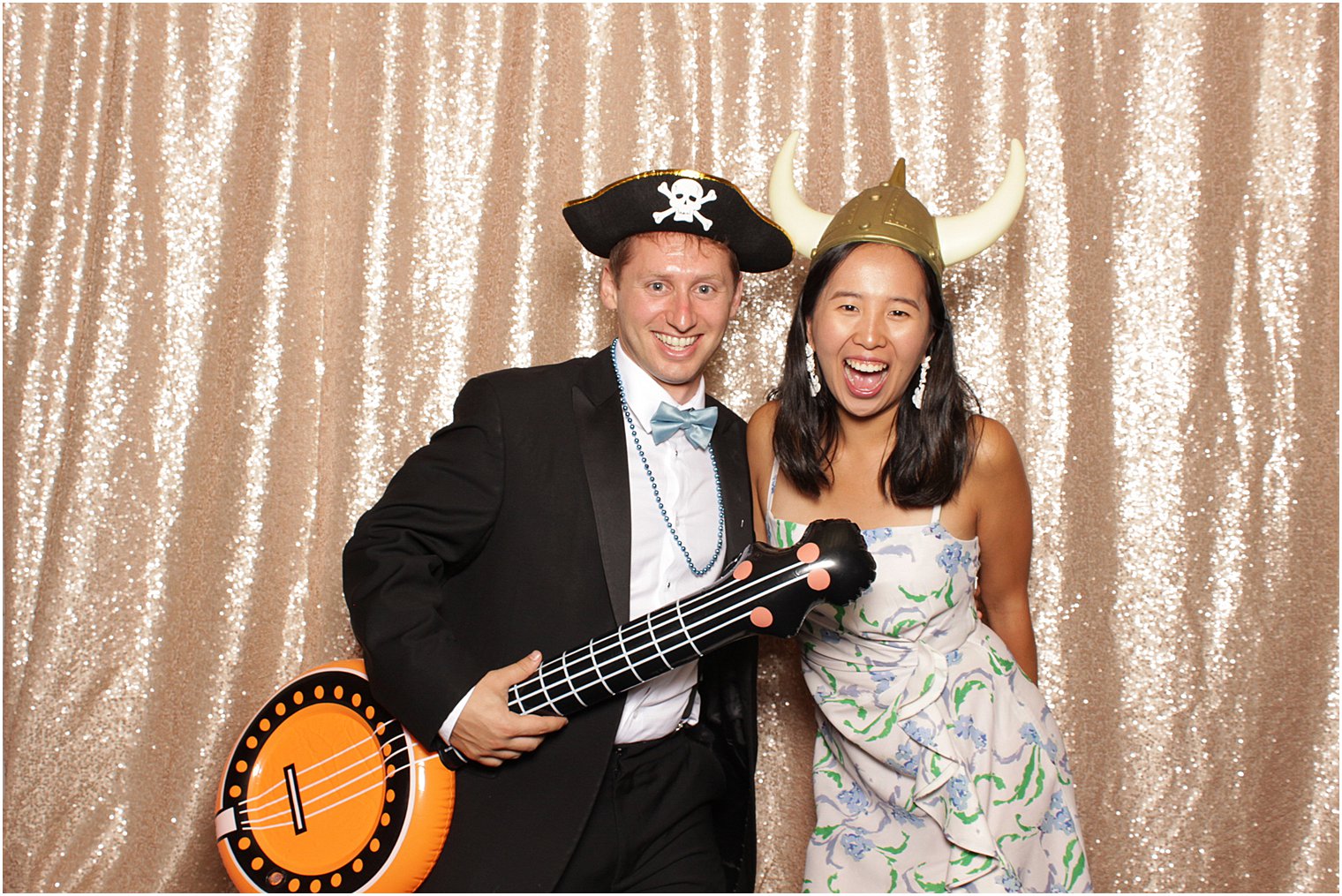 wedding guests wear fun hats during NJ photo booth