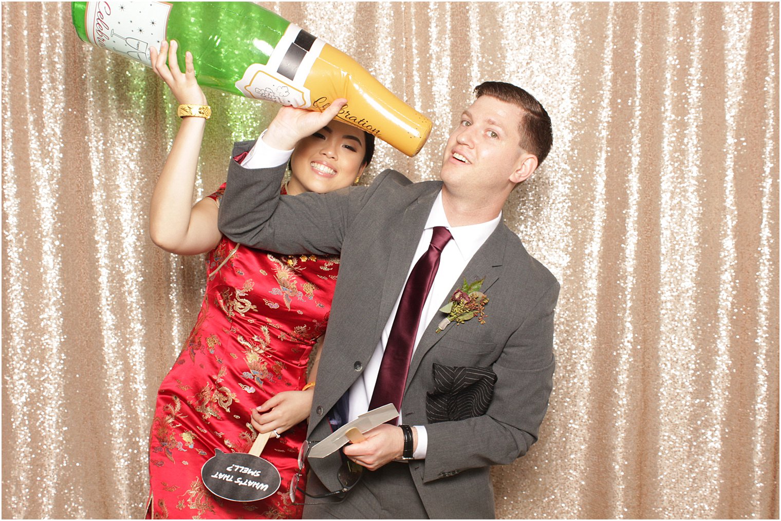 bride and groom pose in Park Chateau Estate Photo Booth